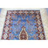 A Nils Nessim Indian-style carpet of pale blue & ivory ground with medallion to centre, & with all-