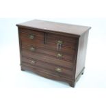 A late Victorian mahogany chest fitted two short & two long drawers with brass swing handles, &on
