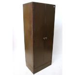 A mid-20th century Sankey Sheldon tall art-metal office cabinet with three adjustable shelves