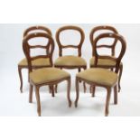 A set of five continental-style balloon-back dining chairs with padded seats &on slender cabriole