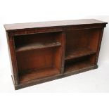 A 19th CENTURY MAHOGANY DWARF STANDING OPEN BOOKCASE with four adjustable shelves & on shaped plinth