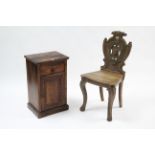 A Victorian oak hall chair with carved & shaped back, hard seat & on cabriole legs; together with