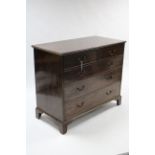 A Georgian mahogany chest fitted two short & three long graduated drawers with brass swan-neck