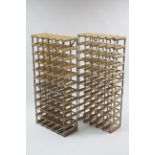 A pair of fifty-five division wine racks, 20¼” wide x 43½” high.