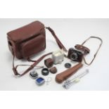 A Yashica “Lynx-1000” camera with various accessories, & case.