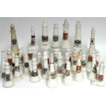 Thirty-six various model lighthouses.