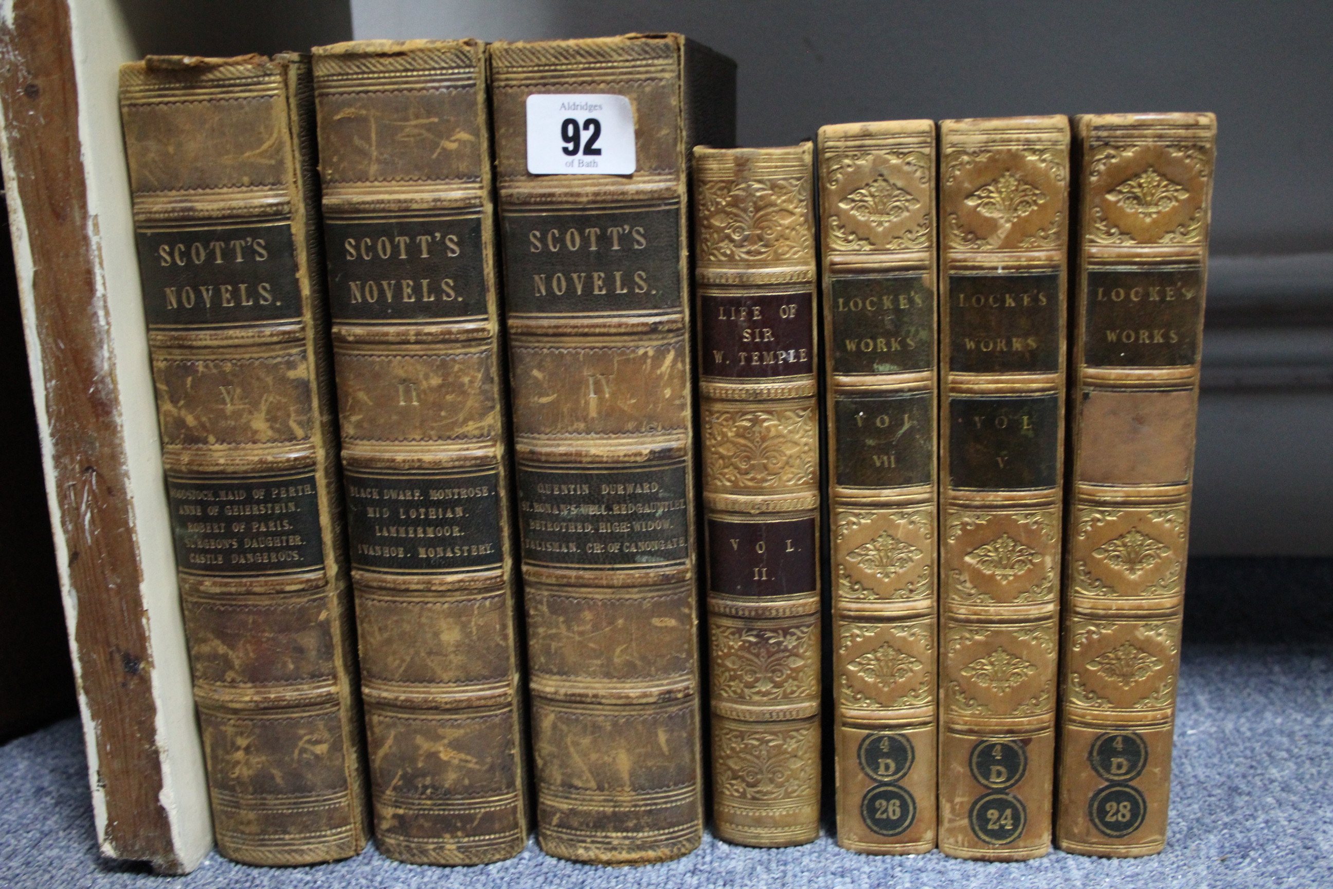 Three 19th century leather-bound volumes “Scott’s Novels”; three 19th century leather-bound