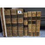 Three 19th century leather-bound volumes “Scott’s Novels”; three 19th century leather-bound
