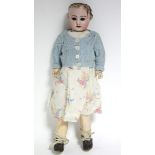 A late 19th/early 20th century Jumeau bisque head girl doll (S.F.B.J. 60 Paris 4/0), with brown