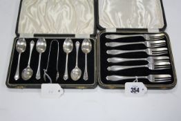 A set of six George VI silver pastry forks, Sheffield 1938; & a set of six George VI silver