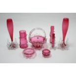 A cranberry glass basket-design bowl; two ditto circular bowls; & five various cranberry glass