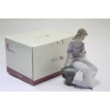 A Lladro Nao porcelain figure “Spring Reflections”, boxed.