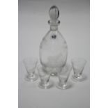 A glass ovoid decanter with finial stopper & with etched design of an antlered animal, 11½”