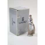A Lladro porcelain large figure “Peaceful Moment”, boxed.