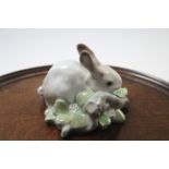 A Lladro porcelain rabbit ornament, 3¼” high. (Slight faults).