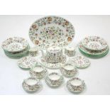 A Mintons “Haddon Hall” pattern thirty-six piece part dinner & tea service.