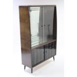 A mid-20th century mahogany finish china display cabinet fitted two plate-glass shelves enclosed