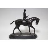 BONHEUR (after). A bronze sculpture of a racehorse with jockey up; 14” high x 14” wide.