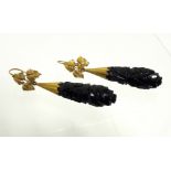 A pair of Victorian carved jet & gold mounted pendant earrings.