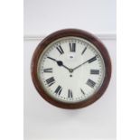 An English dial clock with fusee movement, 13"diam. painted dial with black roman numerals, in oak