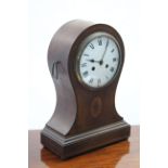 An Edwardian striking mantel clock with 7" diam. white enamel convex dial, eight-day movement, in