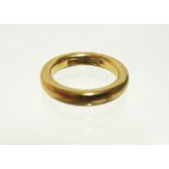 A 22ct. gold wedding band; Birmingham 1927. (9.2 gm).