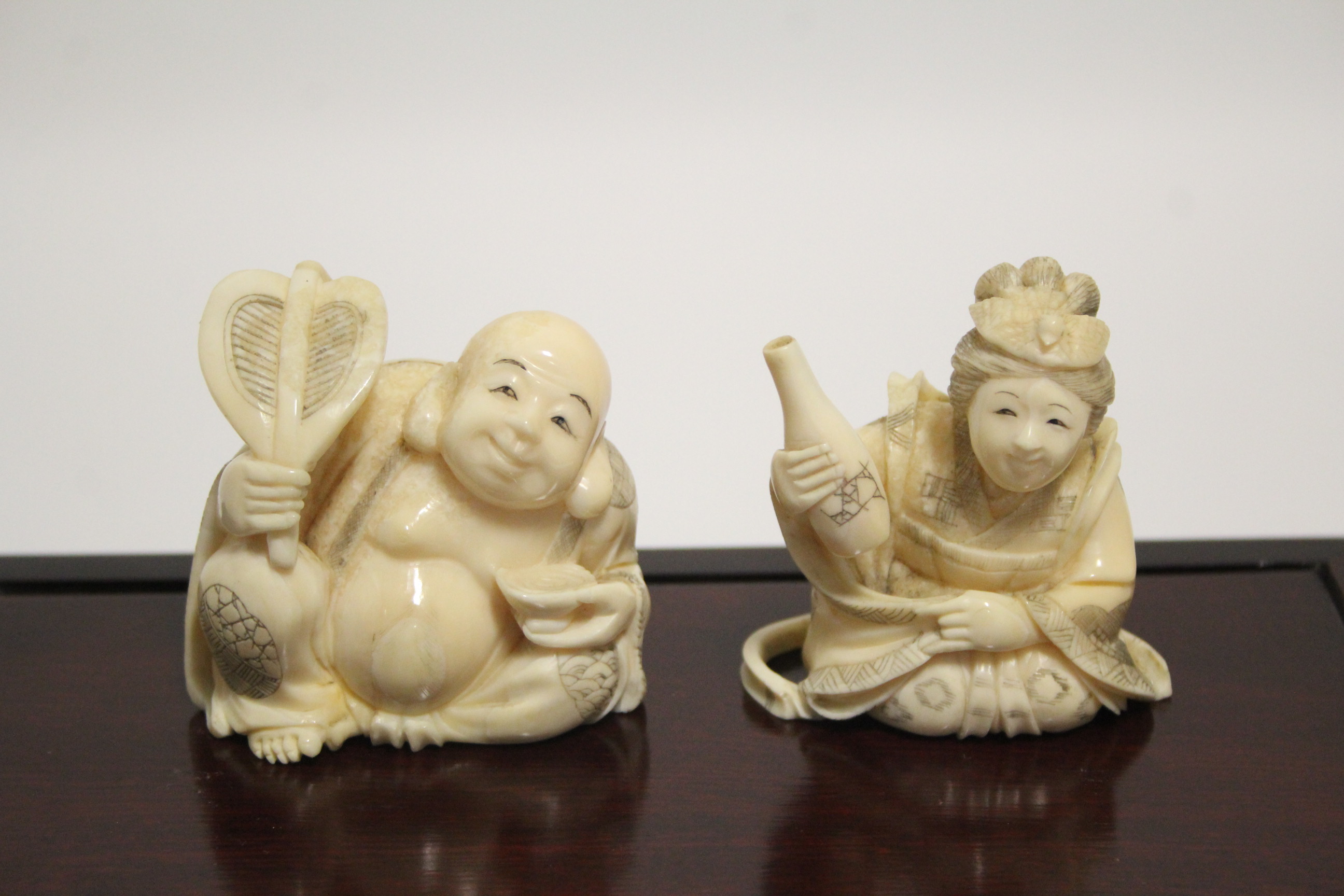 A GROUP OF SEVEN JAPANESE CARVED MARINE IVORY OKIMONO, comprising a standing male figure holding a - Image 9 of 11