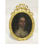 ENGLISH SCHOOL, 18th century; a head-&-shoulders portrait miniature of a lady wearing jewels; oil on