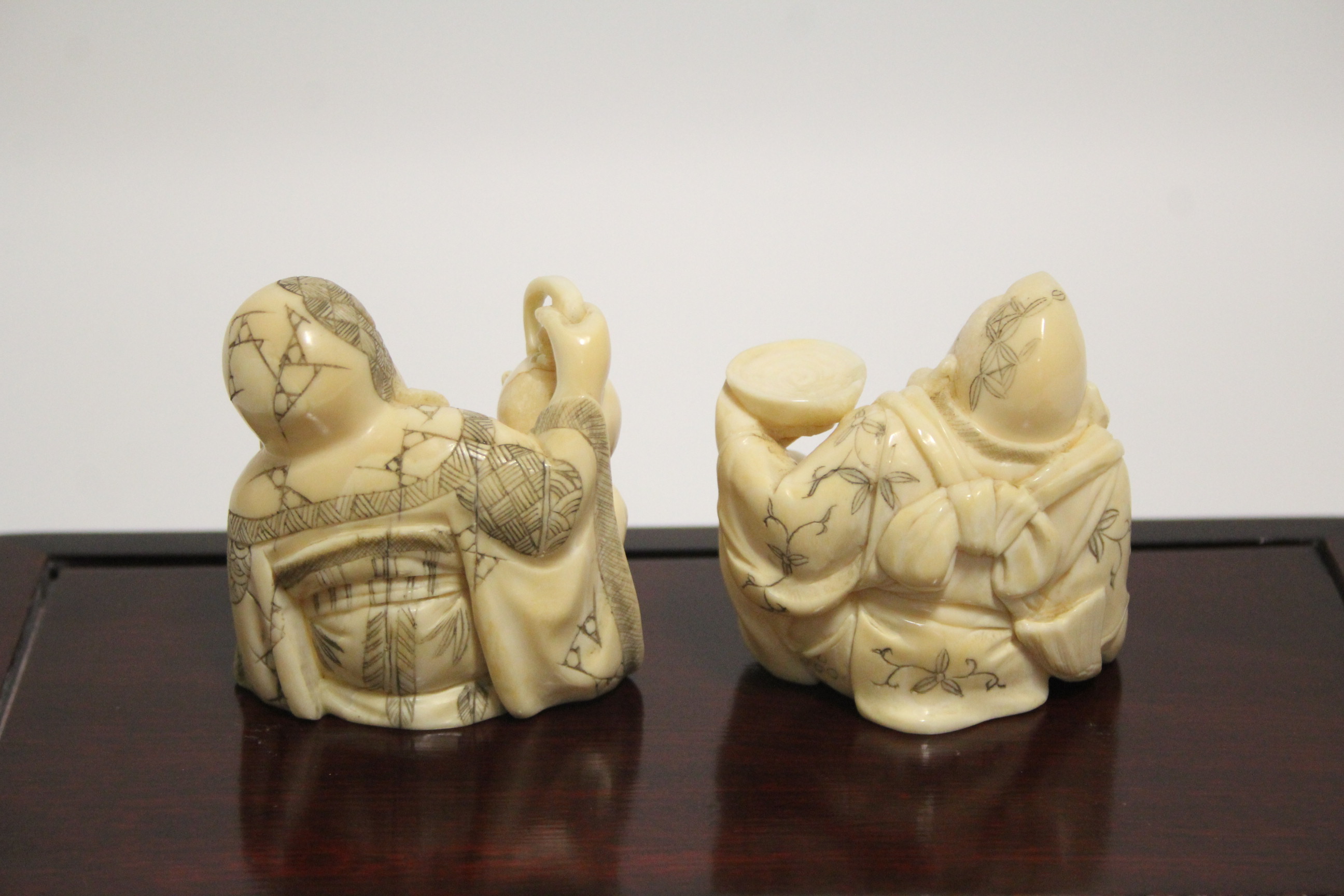 A GROUP OF SEVEN JAPANESE CARVED MARINE IVORY OKIMONO, comprising a standing male figure holding a - Image 7 of 11