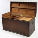 An early 19th century large brass-bound teak storage trunk, the interior fitted till & removable