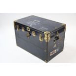 A blue fibre-covered & brass studded travelling trunk with hinged lift-lid & leather carrying