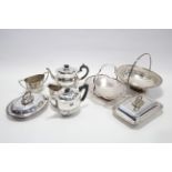 A Walker & Hall silver plated three-piece tea service of oval semi-fluted design; a silver plated