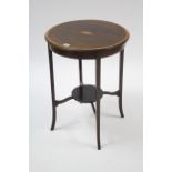 A late 19th/early 20th century inlaid mahogany circular two-tier occasional table with shell motif