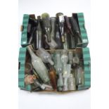 A collection of approximately fifty various coloured & clear glass & stoneware bottles.