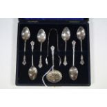 A set of six Edwardian silver teaspoons with fancy terminals; & a ditto pair of sugar tongs & a