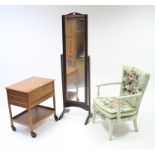 An oak needlework table enclosed hinged lift-lid above along drawer & on square legs & castors