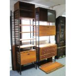 A STAPLES LADDERAX TEAK INTERCHANGEABLE WALL UNIT, fitted with an arrangement of numerous shelves,
