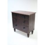 A late Victorian pine small chest fitted two short & two long graduated drawers with turned knob