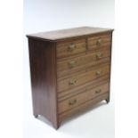 A late Victorian walnut chest fitted two short & three long graduated drawers with brass swing