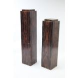Two plywood pedestals, 48” & 41¾” high.