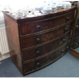 A Victorian mahogany bow-front chest fitted four long graduated drawers with turned knob