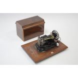 A Singer electric sewing machine with walnut case, w.o.