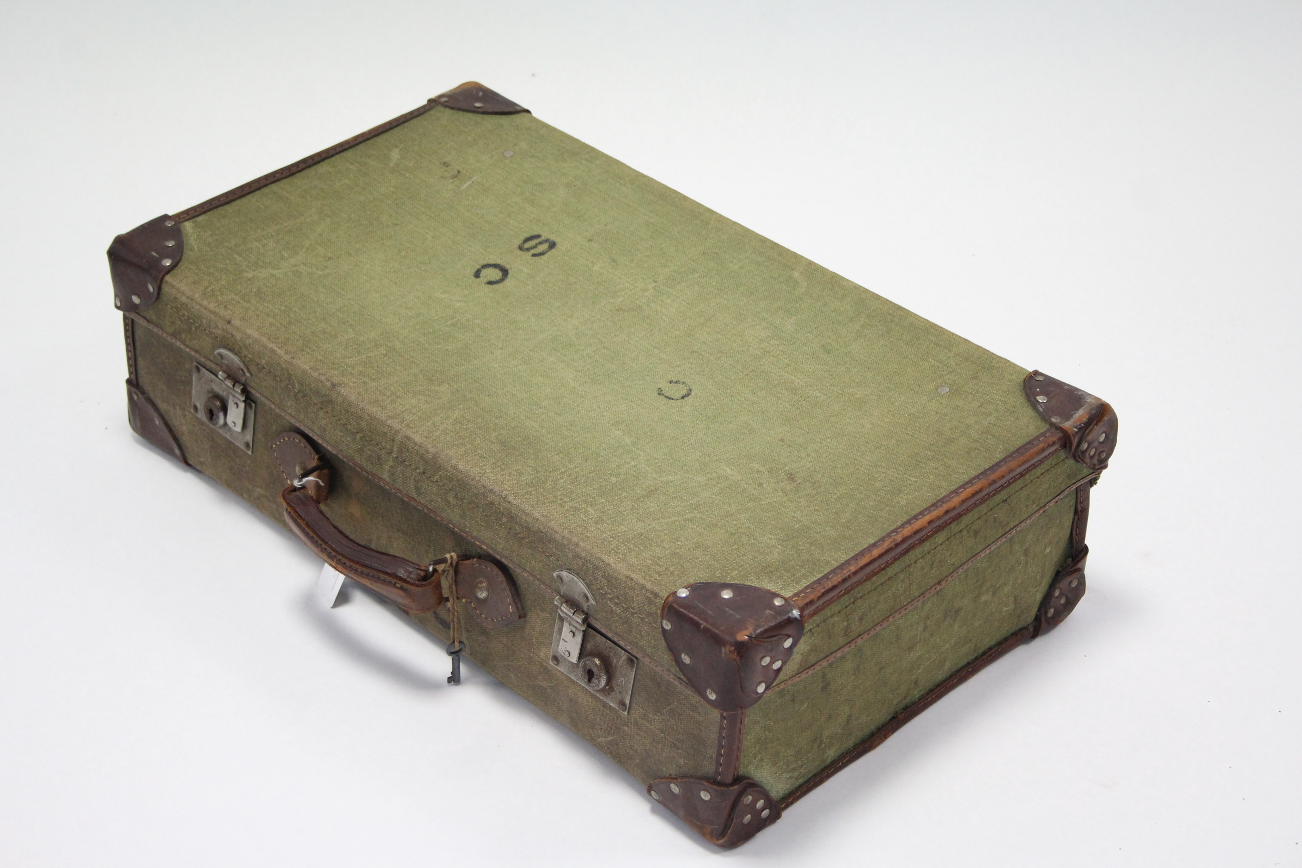 A canvas-covered & leather-bound suitcase, fitted chrome plated twin-lever locks, 26¼” wide; - Image 2 of 2