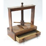 A 19th century LARGE HARDWOOD BOOK-PRESS, the rectangular frame with central wooden worm-screw,