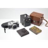 A Kodak Six-20 Brownie Junior box camera; a Konica “C35” automatic camera, each with case; a Players