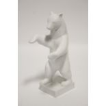 A 20th century Berlin white-glazed standing model of a polar bear; 10" high.