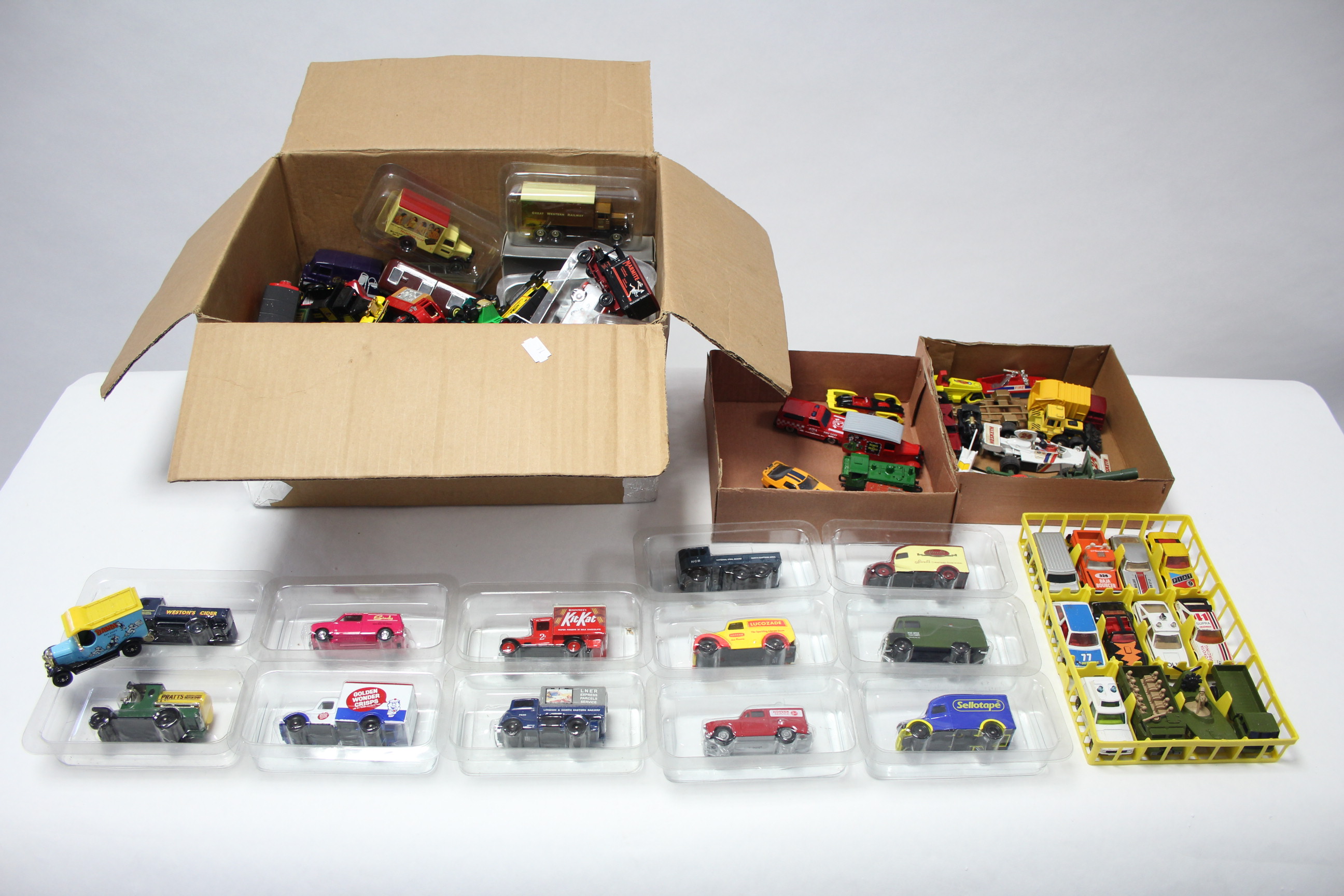 Approximately one hundred various scale models by Corgi, Lledo, & others, boxed & un-boxed.
