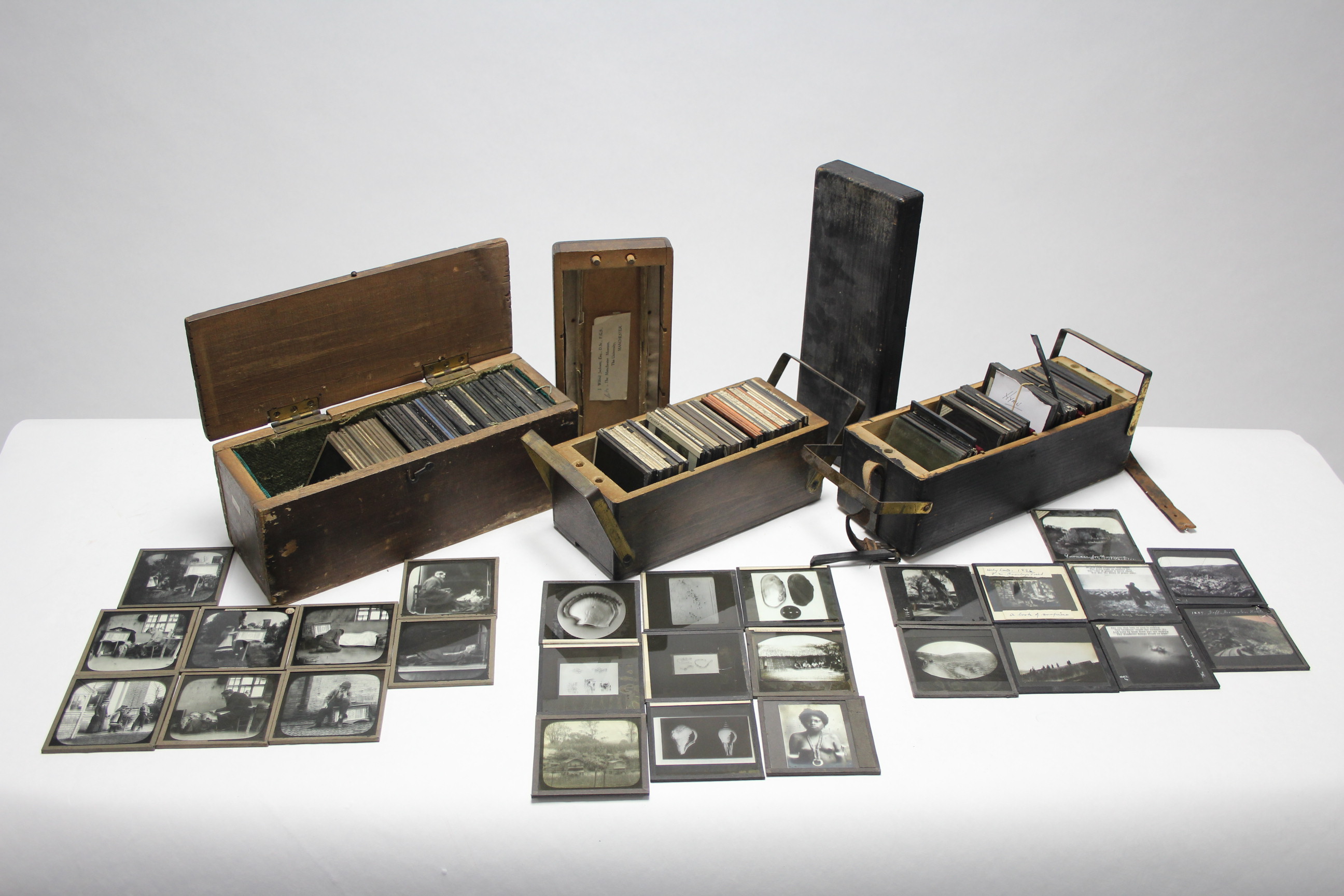 Two sets of Primus magic lantern slides, each set boxed; & various other magic lantern slides,