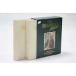 A set of two volumes “The Bradman Albums” printed at the Macdonald Queen Anne Press.