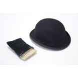 A Dunn & Co. black felt bowler hat.